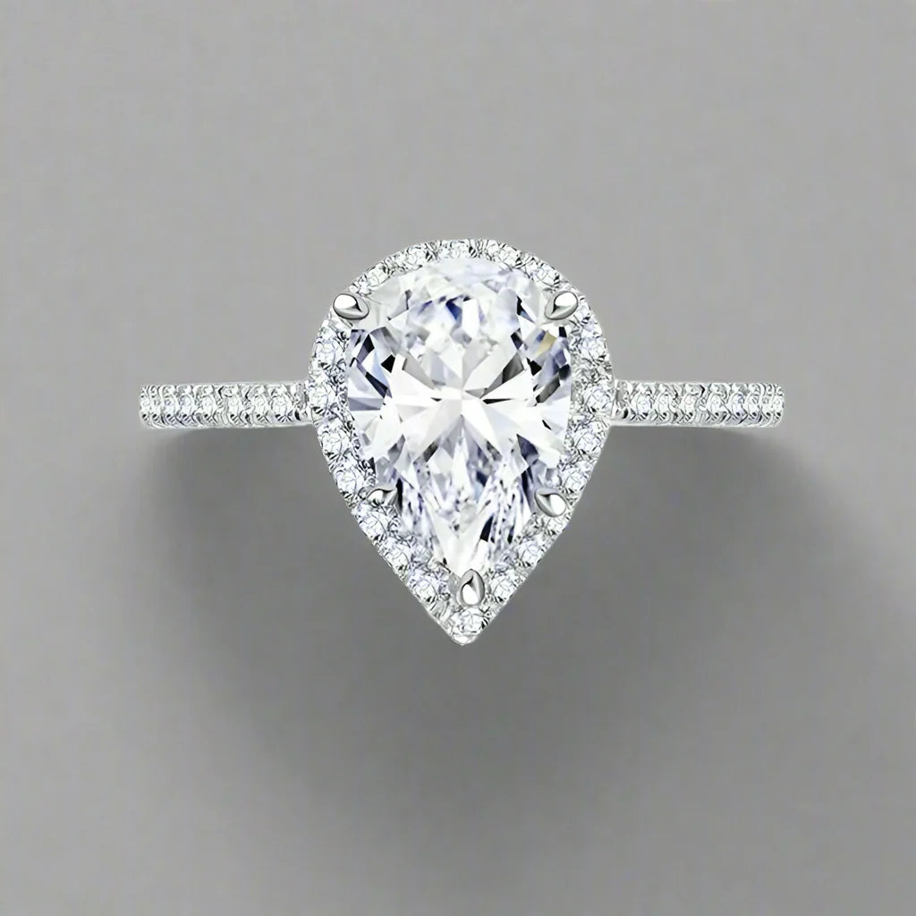 0.81 Carat Natural Pear Diamond Cluster Engagement Ring